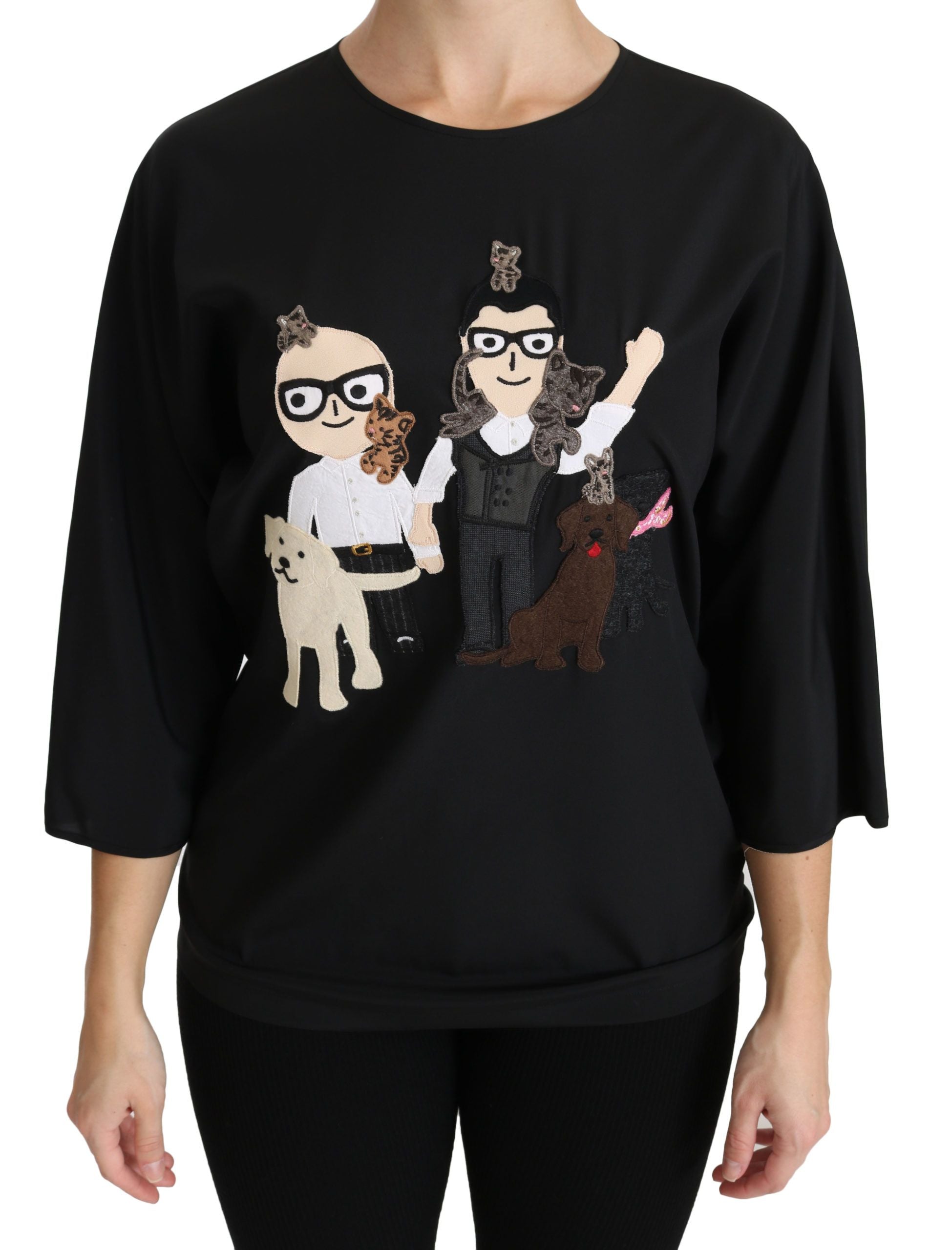 T-shirt en soie noire Dolce & Gabbana #dgfamily, blouse élégante avec logo, visible en gros plan sur un fond neutre.