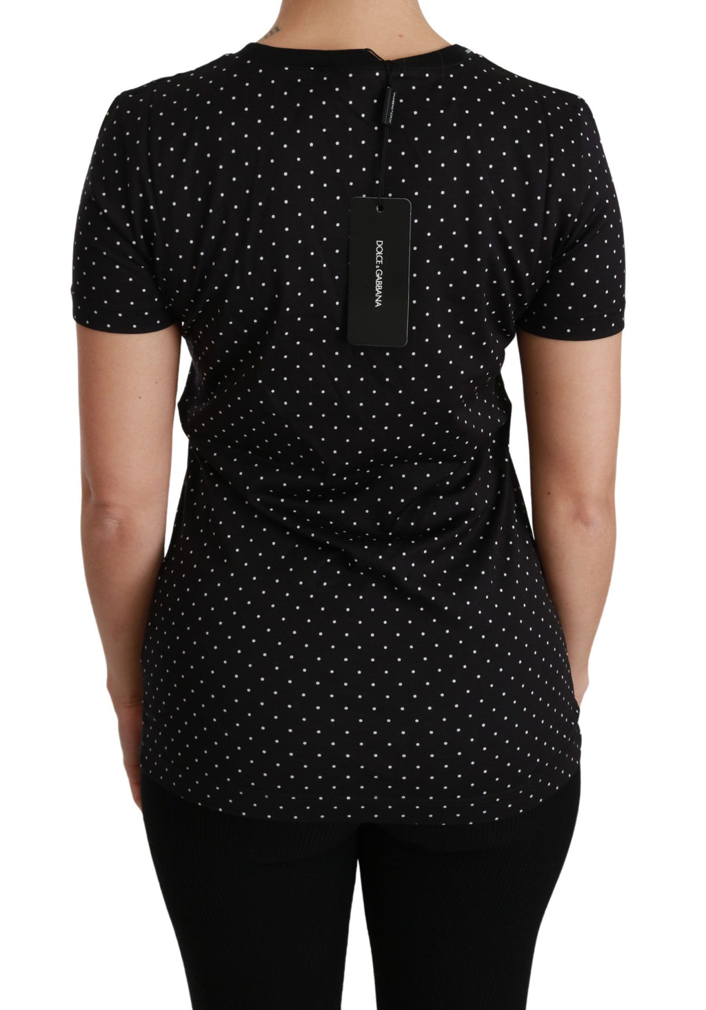 T-shirt noir à pois Dolce & Gabbana en coton avec col rond, détail visible sur le haut de la poitrine.