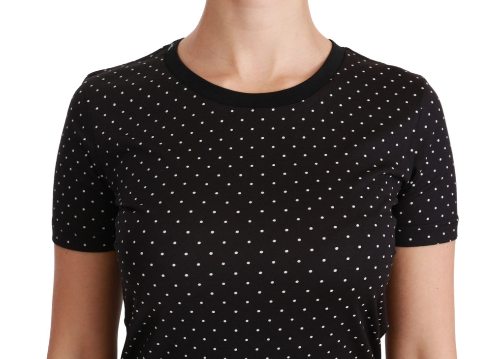 T-shirt noir Dolce & Gabbana en coton à pois, col rond, style décontracté, visible avec détails de points noirs sur fond blanc.