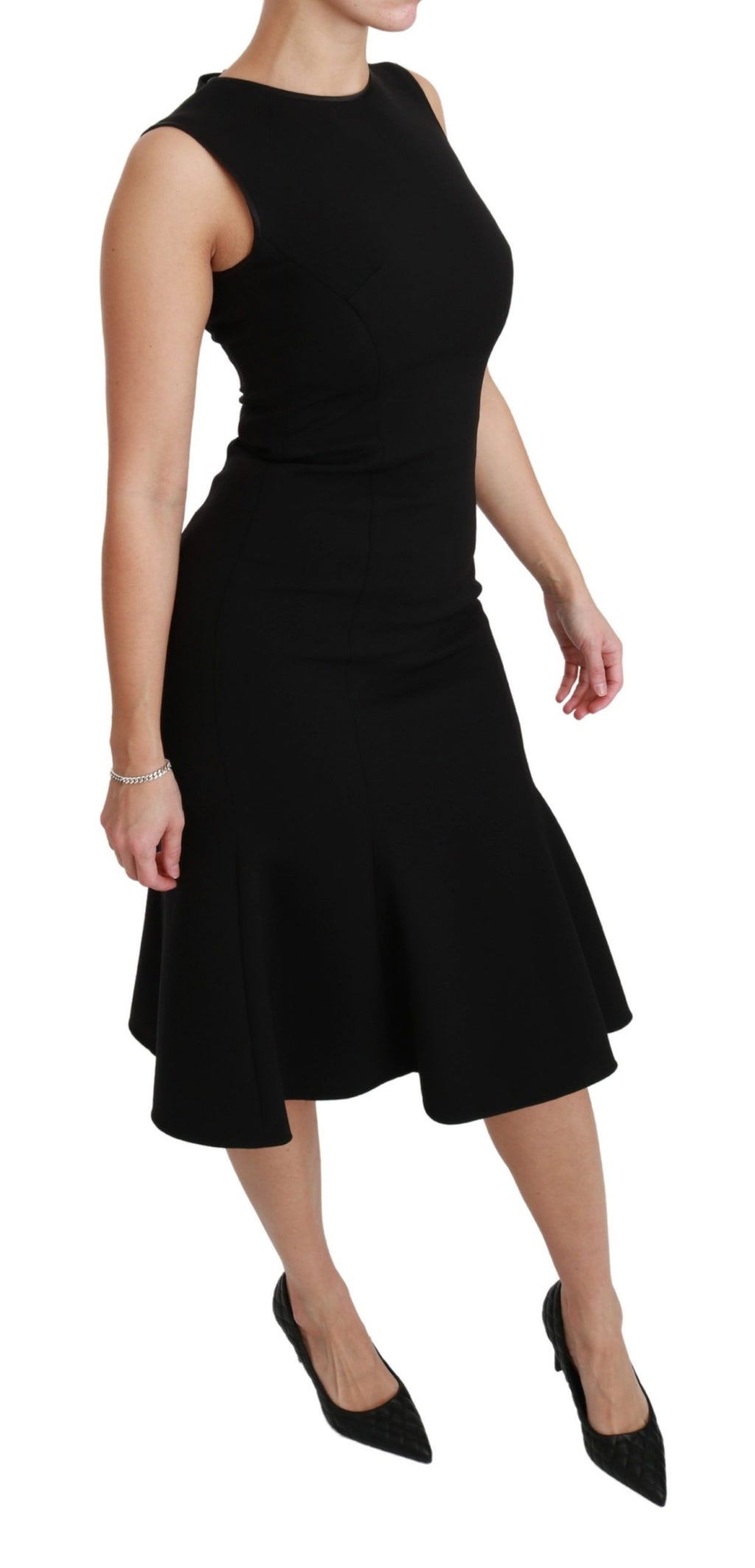 Robe droite en laine stretch noire de Dolce & Gabbana, coupe évasée et ajustée, élégante et sophistiquée.