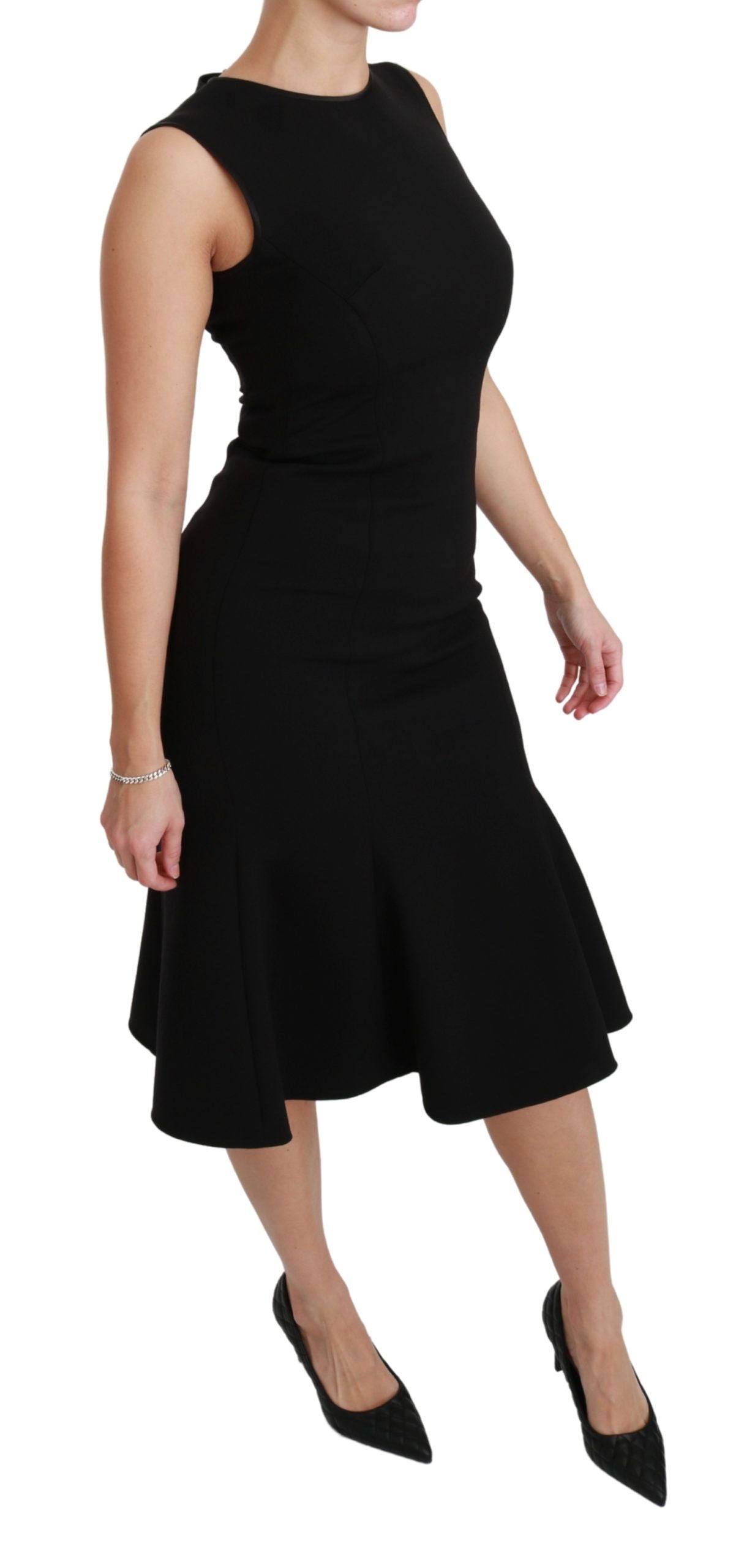 Robe droite en laine stretch noire de Dolce & Gabbana, coupe évasée et ajustée, élégante et sophistiquée.
