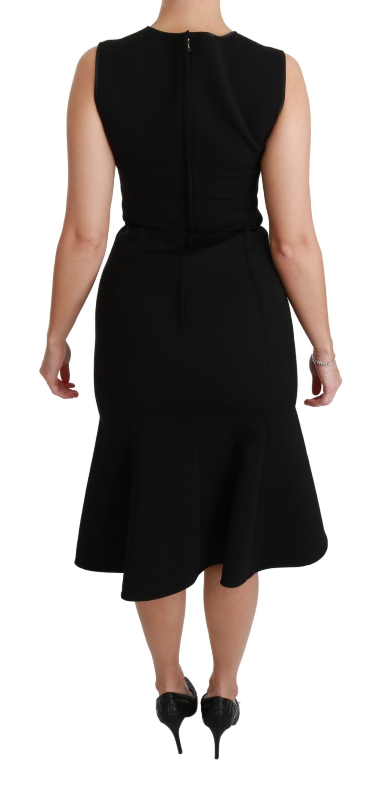 Robe noire Dolce & Gabbana en laine stretch, coupe ajustée et évasée, pour un look élégant et sophistiqué.