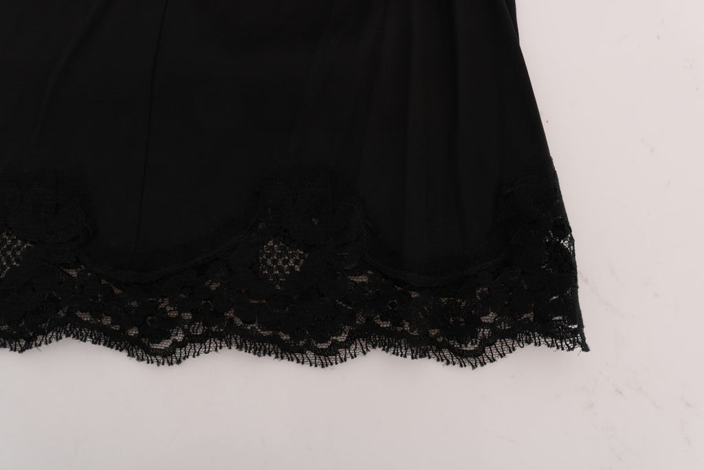 Jupe trapèze noire Dolce & Gabbana avec broderie florale, découpes en dentelle élégante, style sophistiqué et féminin