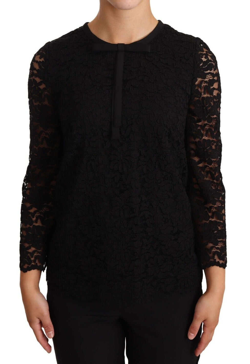 Blouse noire en dentelle florale en nylon de Dolce & Gabbana, détail élégant et tissu délicat visible sur l'image.