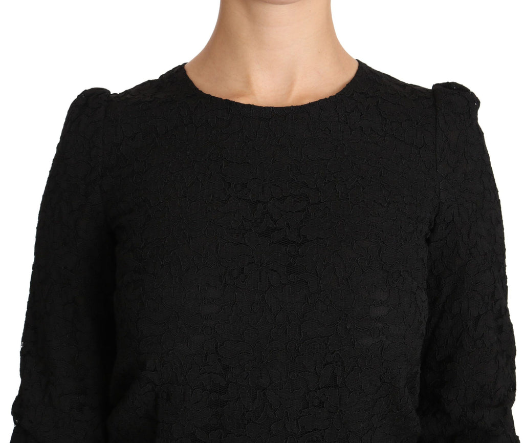 Haut noir en dentelle florale Dolce & Gabbana avec fermeture éclair, blouse élégante et détaillée, vue de face.