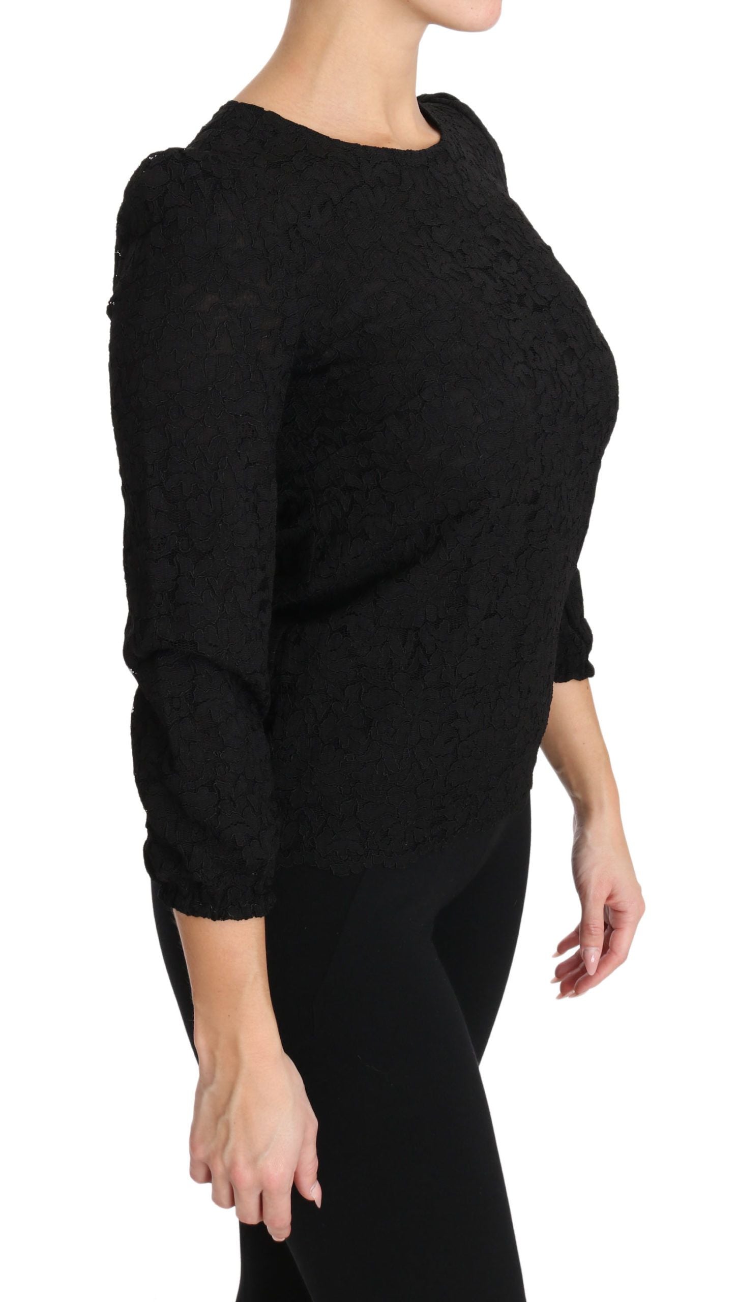 Blouse noire Dolce & Gabbana en dentelle florale avec fermeture éclair, style élégant et sophistiqué pour femme.