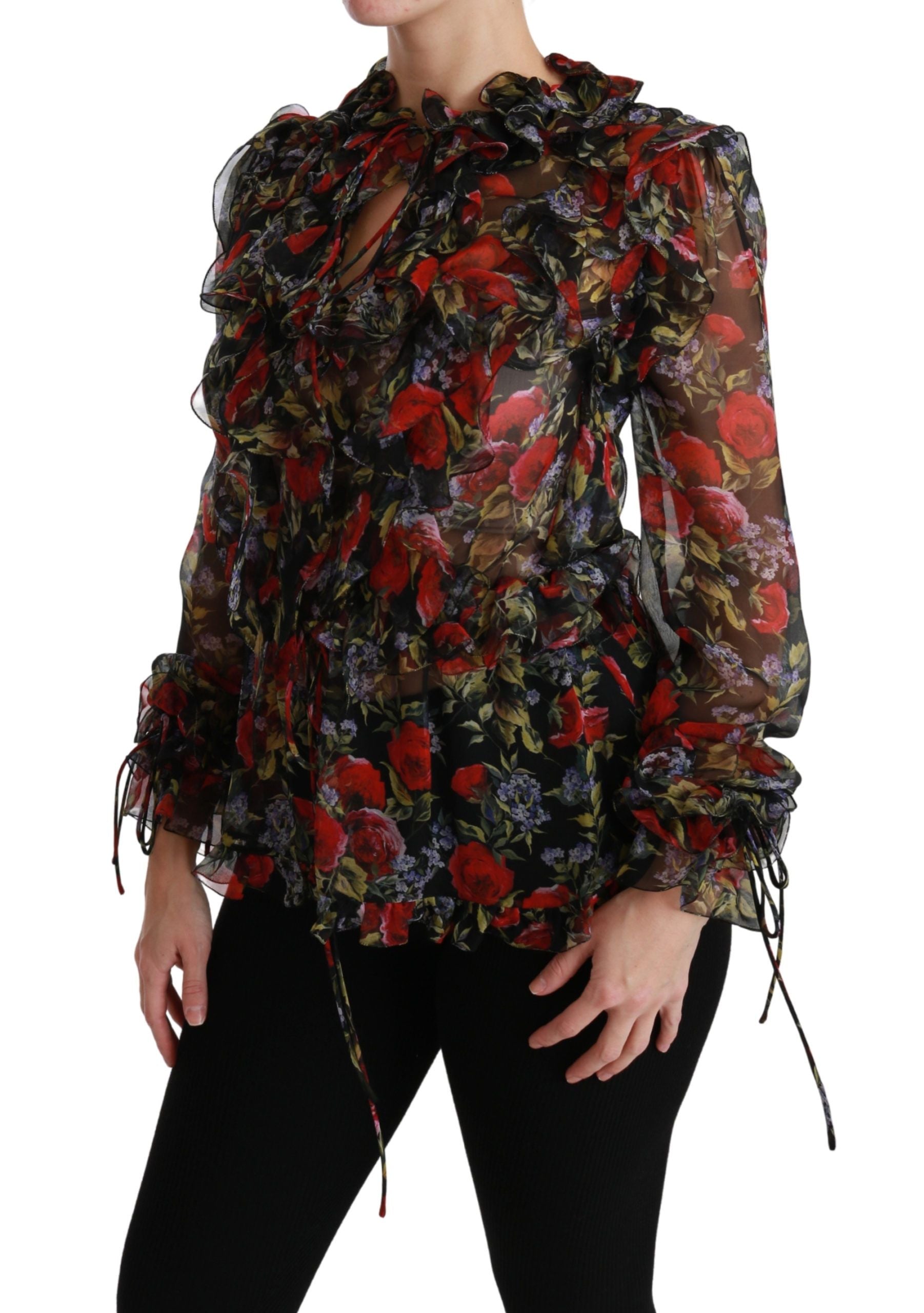 Blouse en soie noire avec motifs floraux roses Dolce & Gabbana, style élégant et féminin, vue de face.