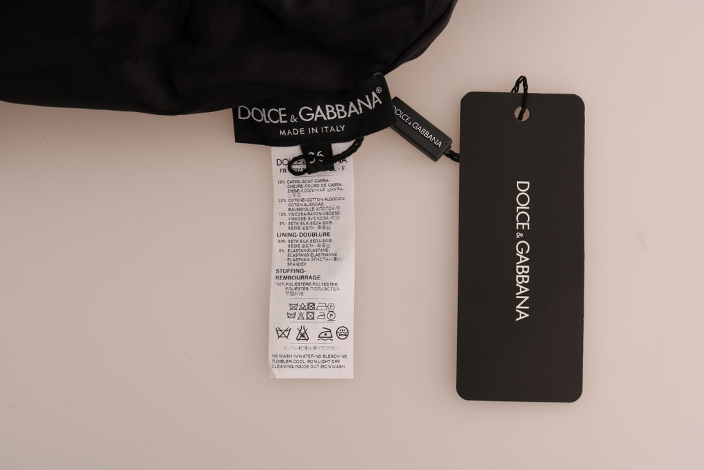 Pull Dolce & Gabbana en brocart floral noir avec fermeture éclair et fourrure, style élégant et chic.