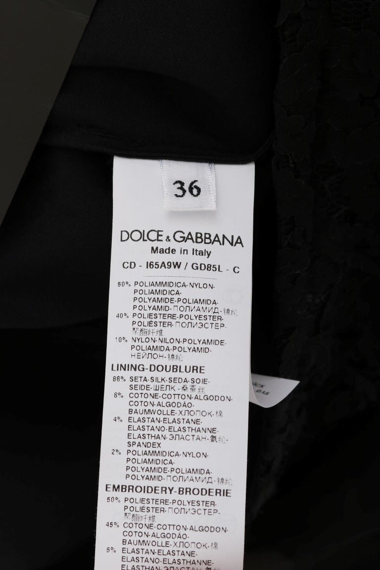 Robe noire en dentelle Dolce & Gabbana avec cœur rouge, coupe fluide et élégante pour femme.
