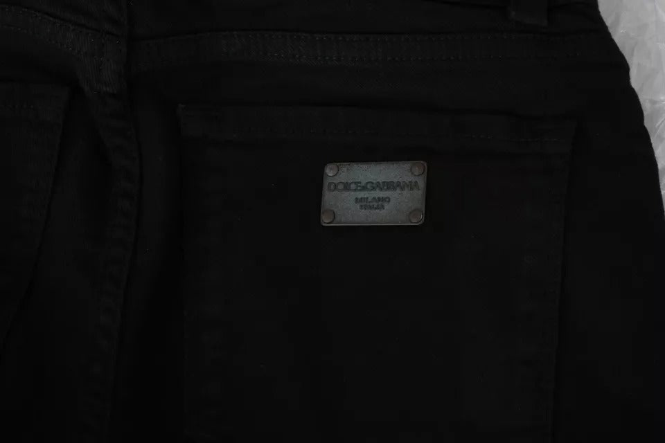 Jeans slim en coton stretch noir à taille mi-hauteur de Dolce & Gabbana, style décontracté avec coupe ajustée et détails modernes.