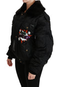 Veste bomber noire Dolce & Gabbana avec couronne de reine en sequins, style élégant et luxueux, vue de face.