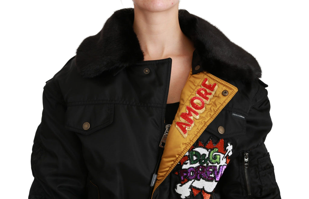 Veste bomber noire Dolce & Gabbana avec couronne de reine en sequins, style élégant et luxueux.