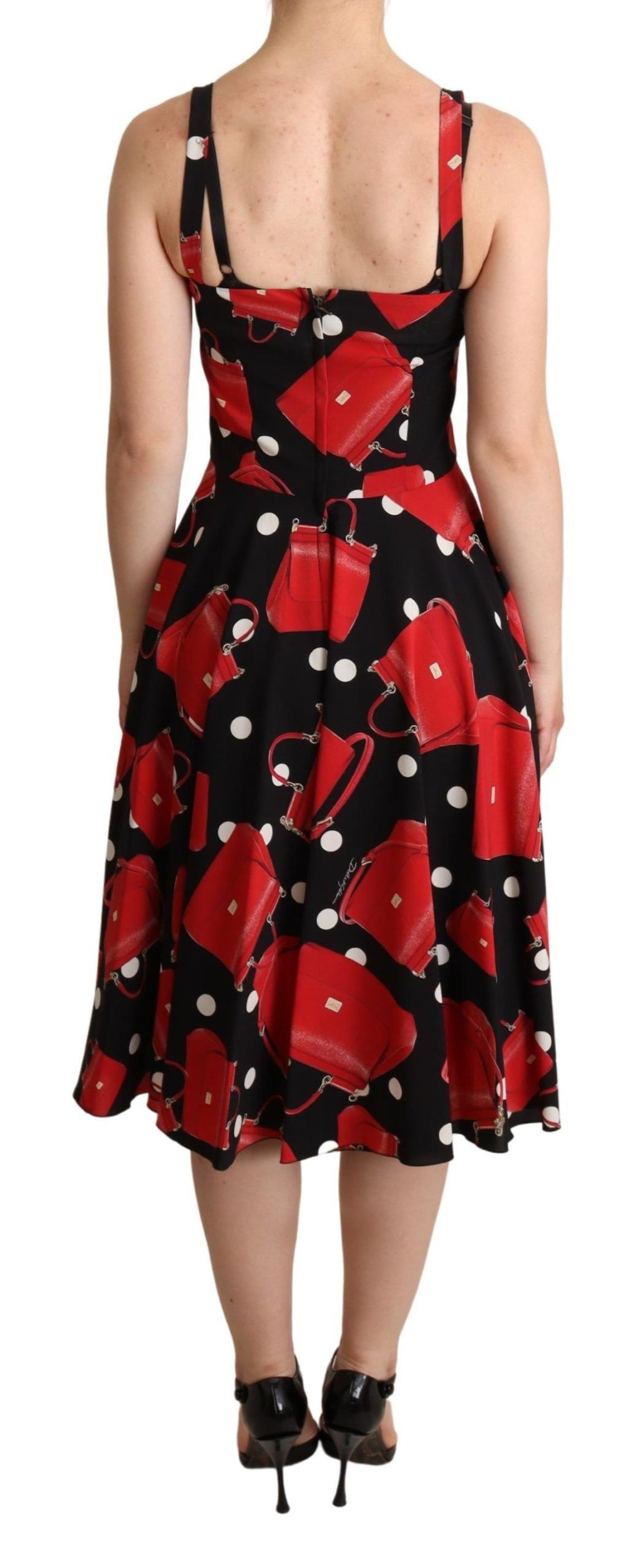 Robe mi-longue Dolce & Gabbana à imprimé rouge et noir, coupe en A, style élégant, tissu fluide et sophistiqué.