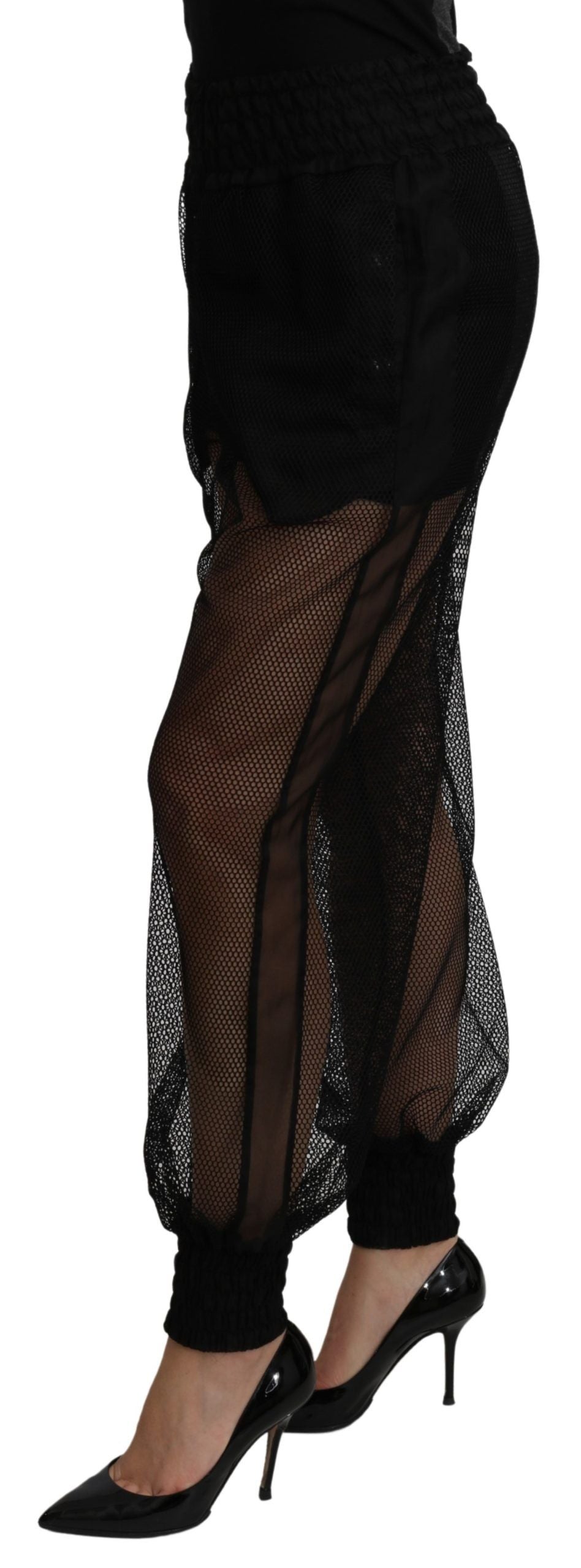 Pantalon jogger en polyester noir transparent de Dolce & Gabbana, style décontracté et élégant.