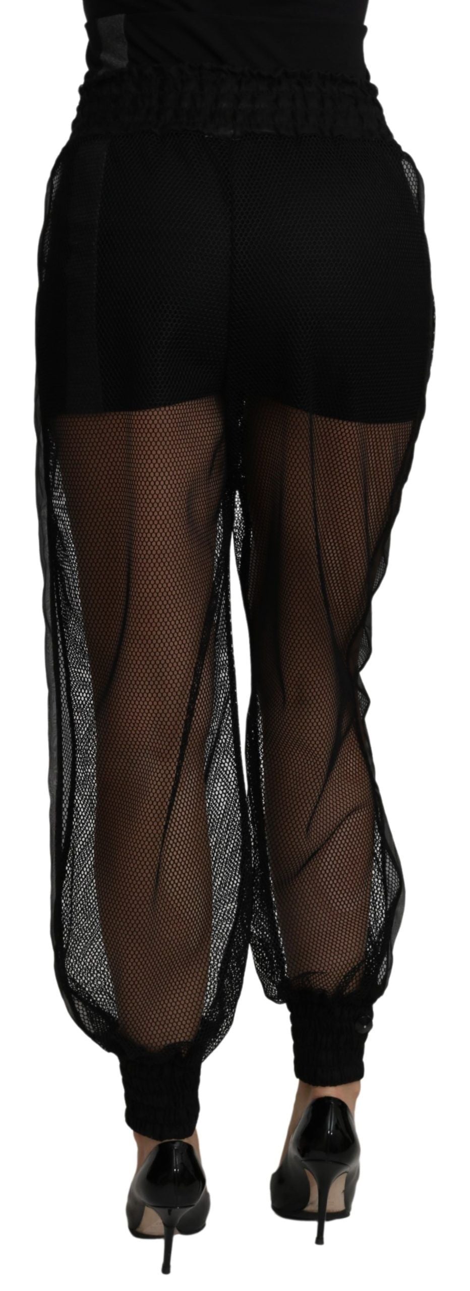 Pantalon jogger en polyester noir transparent de Dolce & Gabbana, style décontracté et moderne.