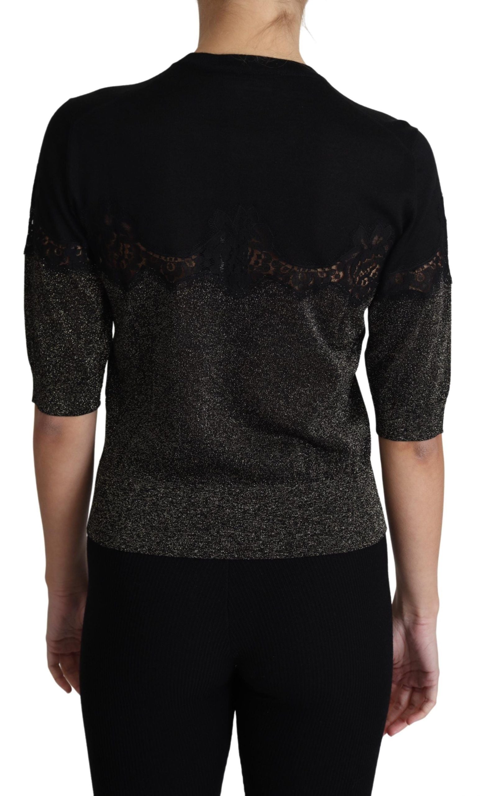 Pull Dolce & Gabbana noir en lurex brillant avec inserts en dentelle, style élégant et sophistiqué.