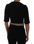 Veste courte noire Dolce & Gabbana blazer cropped avec col et manches longues, élégante et tendance.