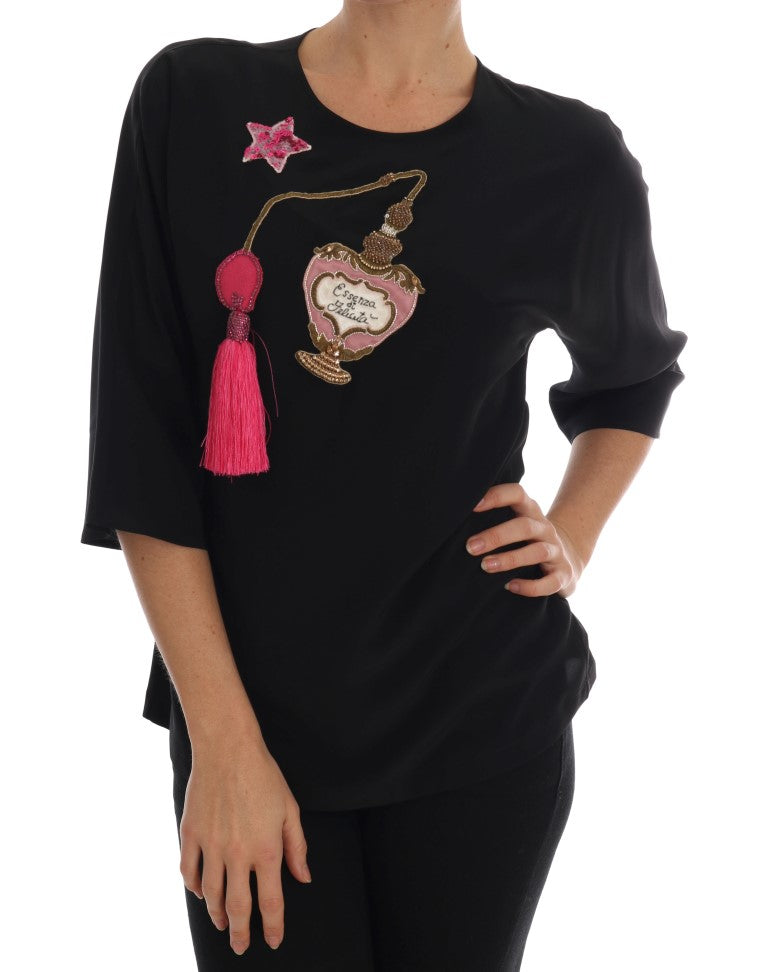 Haut en soie noire Dolce & Gabbana Fairy Tale avec cristaux, élégant et féminin, porté avec détails délicats et design sophistiqué.