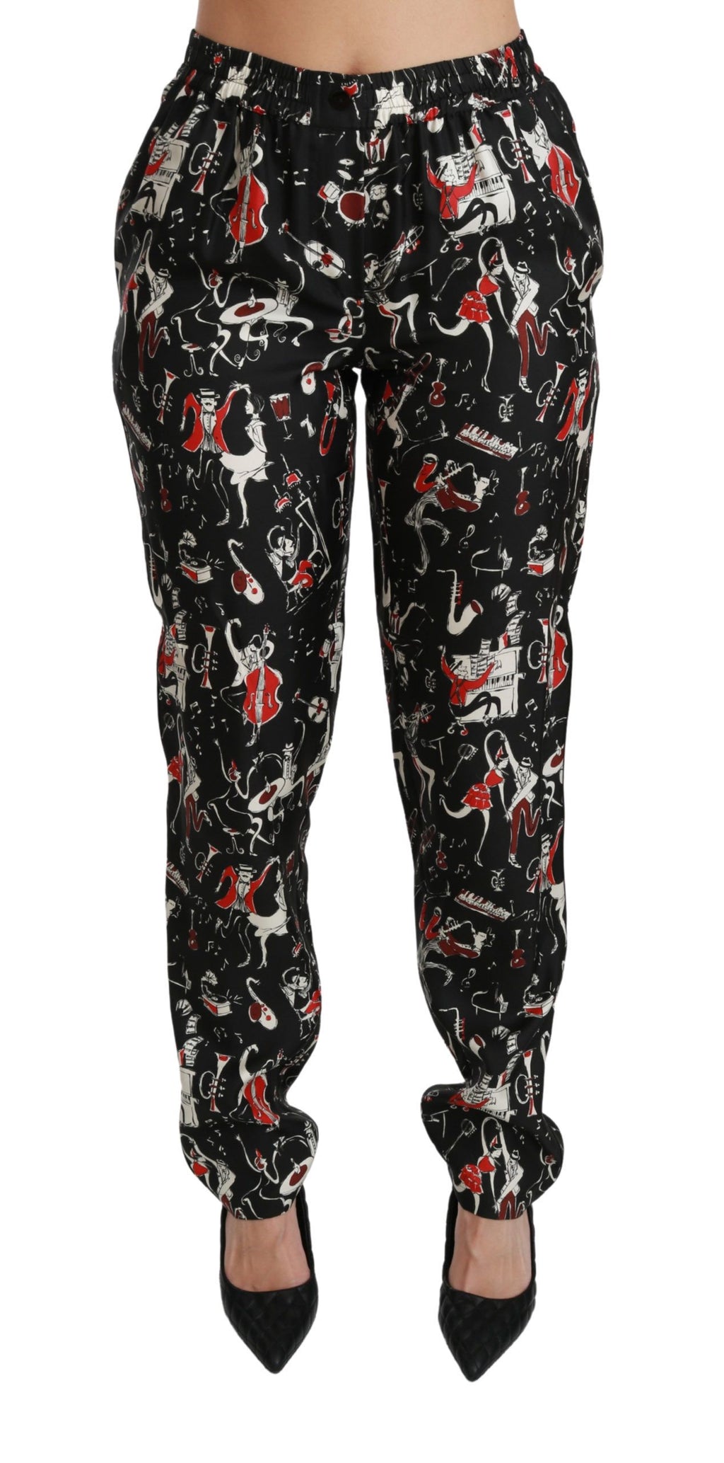 Pantalon noir en soie Dolce & Gabbana, coupe mi-haute, avec ceinture élégante et détails sophistiqués.
