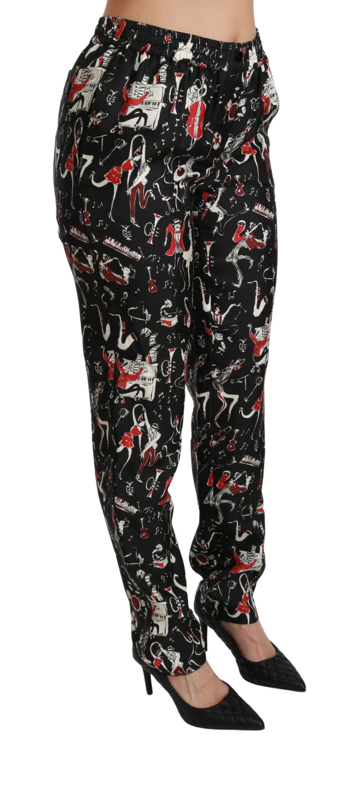 Pantalon noir en soie Dolce & Gabbana, taille mi-haute, style élégant et sophistiqué, visible avec une coupe fluide.