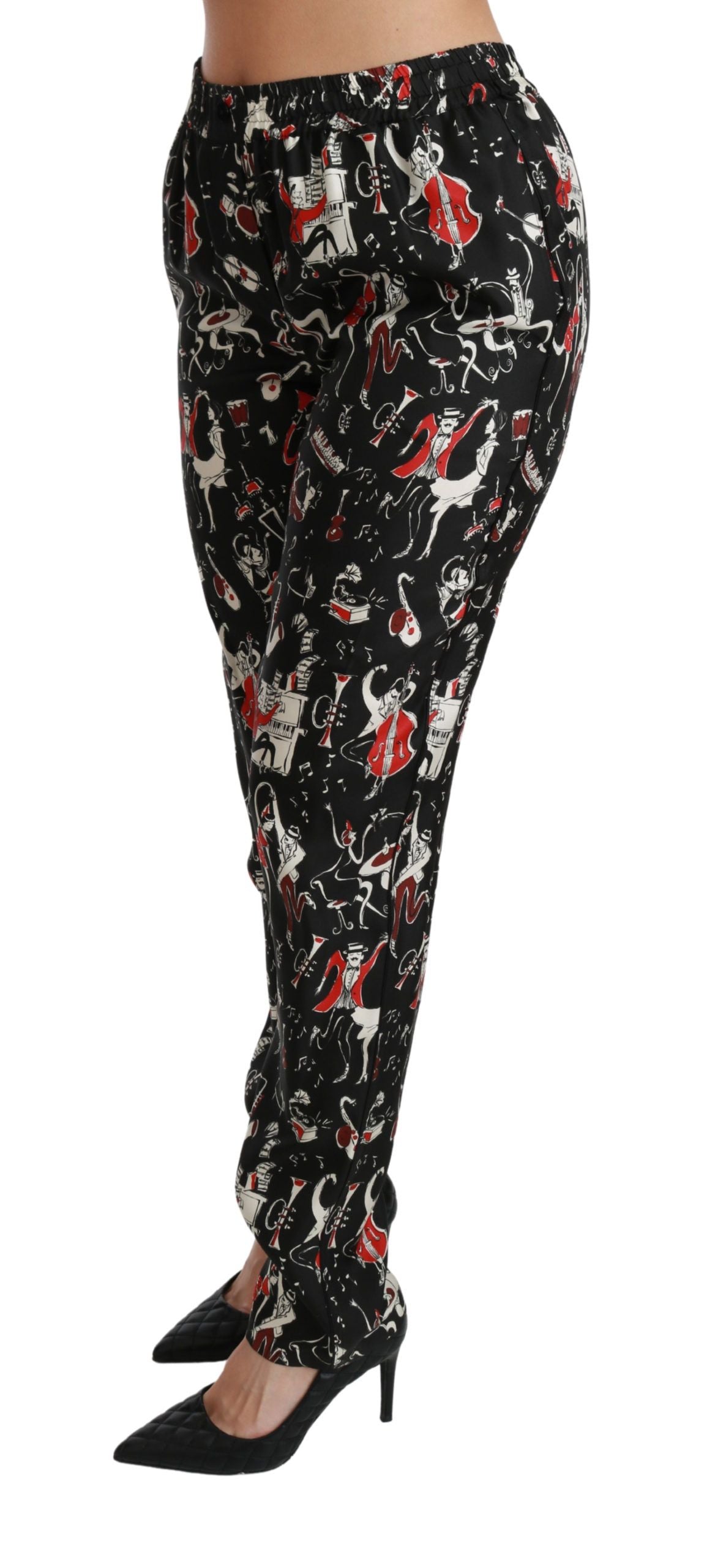 Pantalon noir en soie Dolce & Gabbana, coupe mi-hauteur, style élégant et sophistiqué, visible en détail dans l’image.