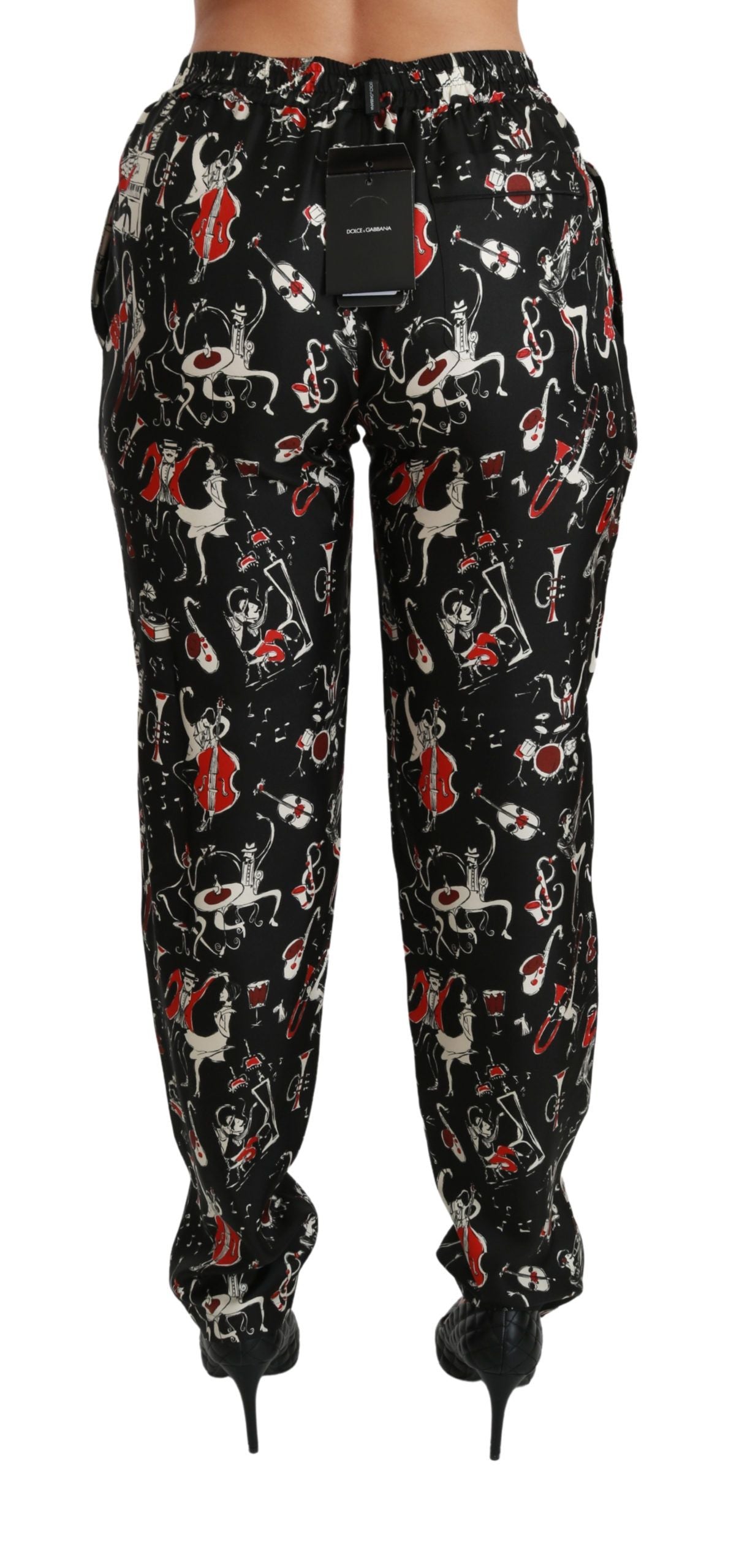 Pantalon noir en soie Dolce & Gabbana, à taille moyenne, avec coupe élégante et détails sophistiqués, vue de face.