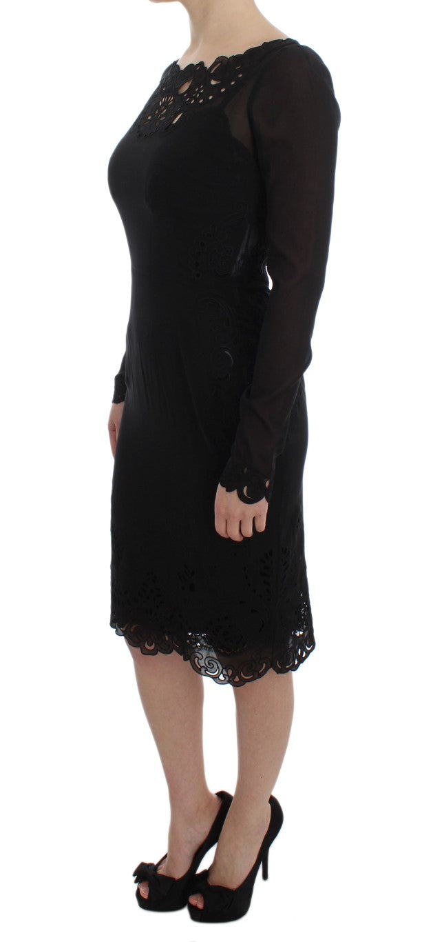 Robe noire en soie extensible Dolce & Gabbana, coupe ajustée, élégante et raffinée, visible sur un fond neutre.