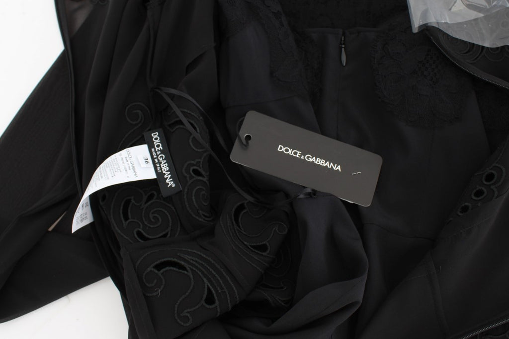 Robe chemise en soie noire extensible Dolce & Gabbana, ajustée et élégante, vue de face sur fond blanc.