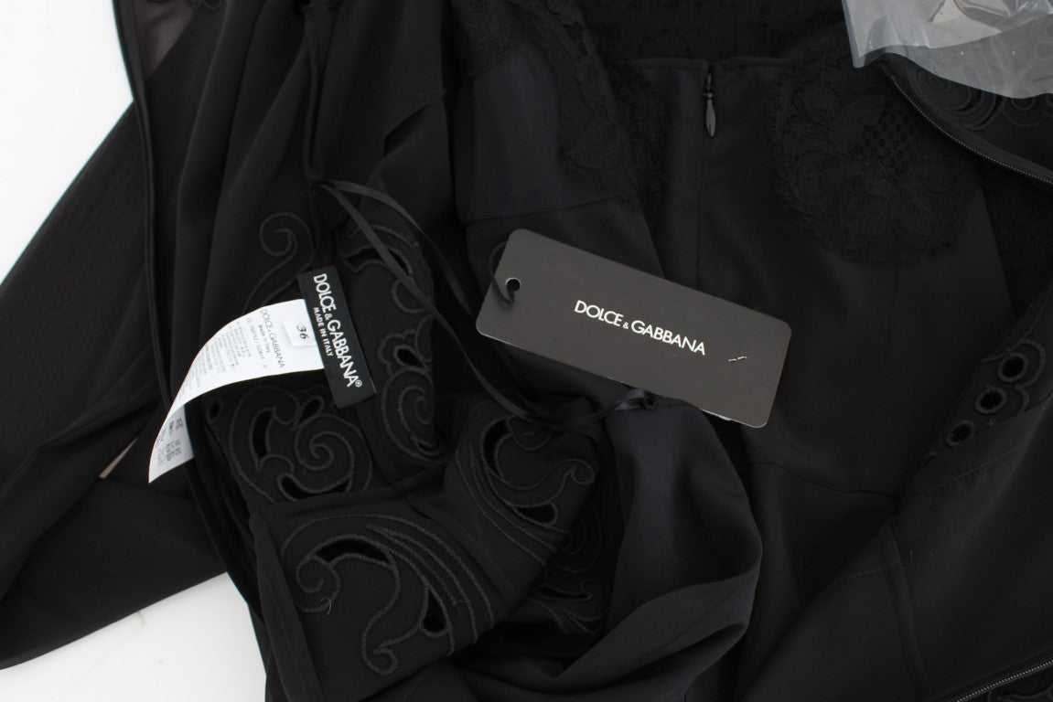 Robe chemise en soie noire extensible Dolce & Gabbana, ajustée et élégante, vue de face sur fond blanc.