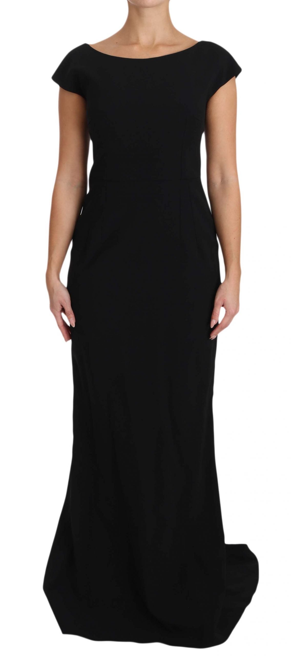 Robe longue noire Dolce & Gabbana, ajustée et évasée, en tissu stretch, élégante et fluide, portée avec des détails sophistiqués.