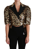 Veste blazer Dolce & Gabbana en sequins or et léopard, style sophistiqué avec motif animalier brillant.