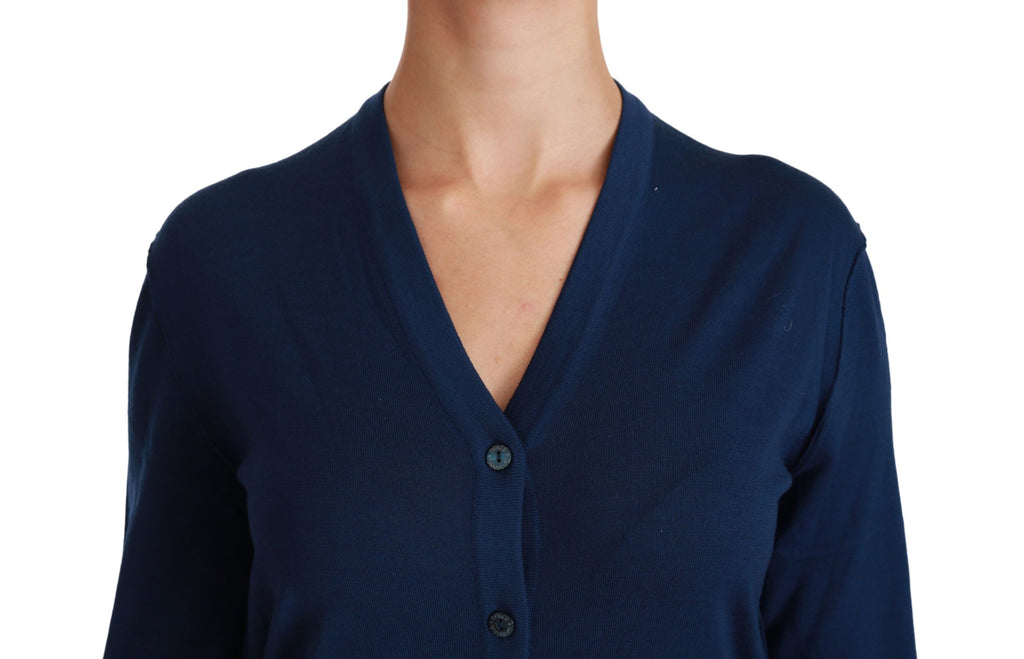 Cardigan bleu Dolce & Gabbana en laine vierge avec boutons, pull élégant et confortable pour femme.