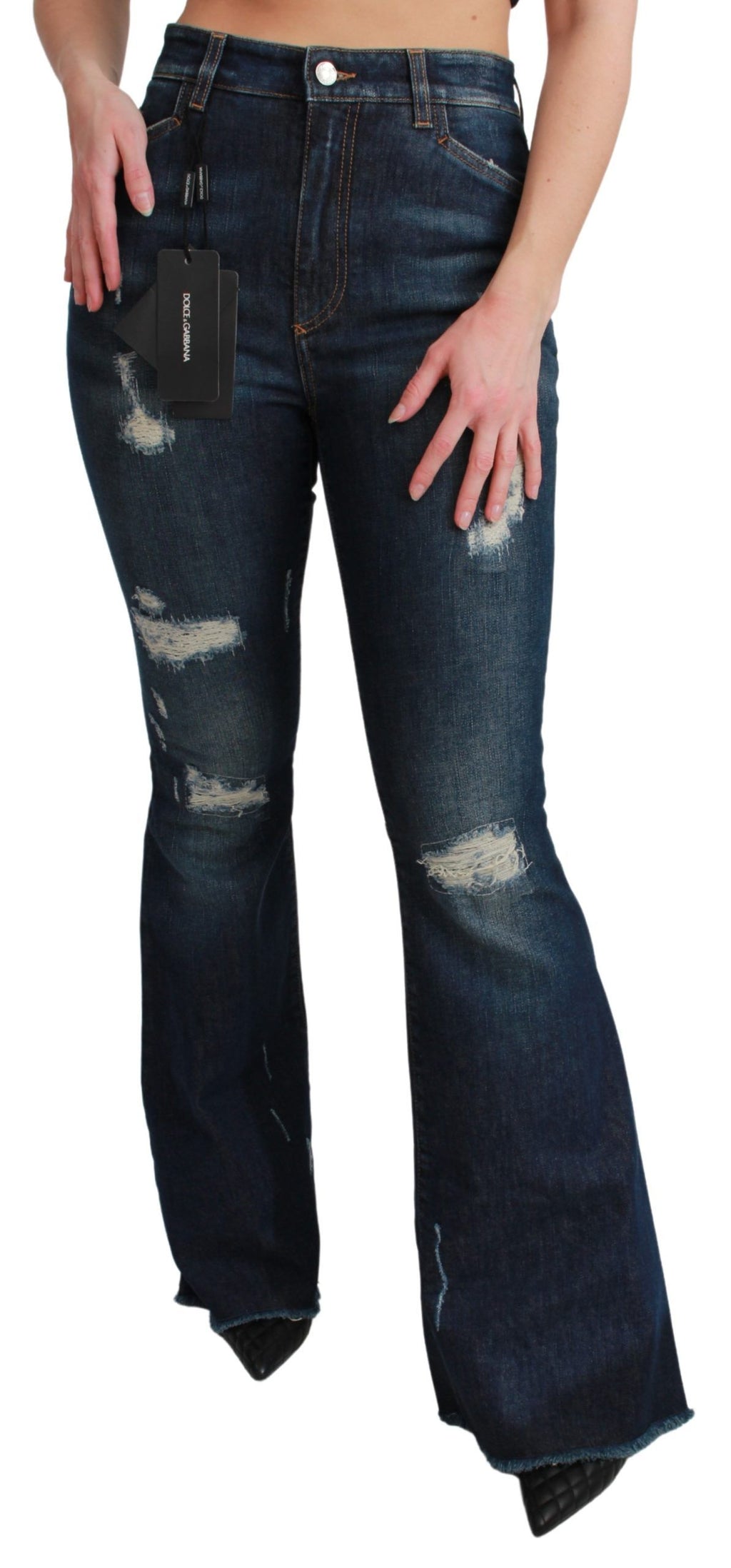 Jean flare en denim bleu en coton extensible de Dolce & Gabbana, vue en détail sur le produit.