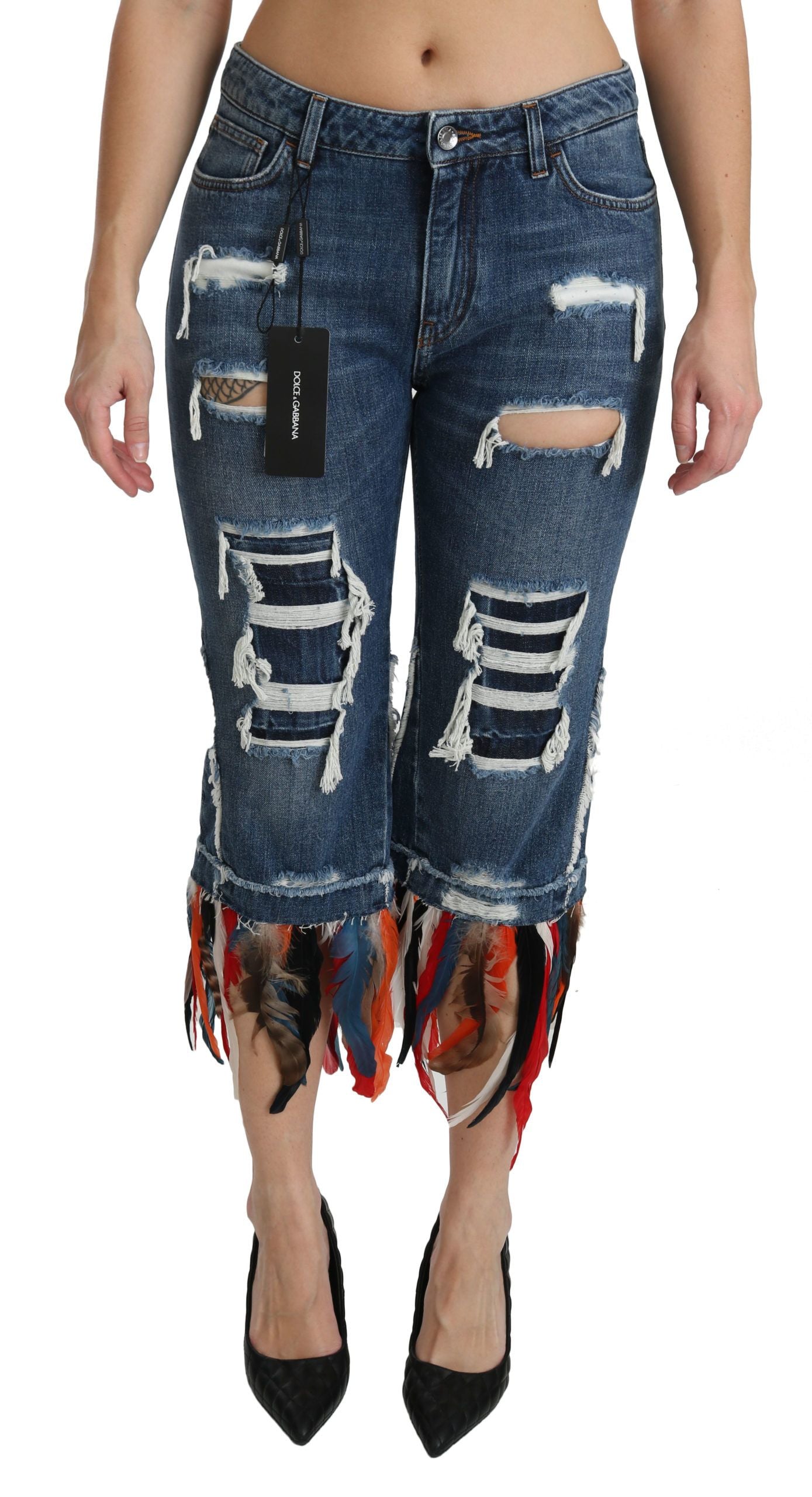 Jean coton coupe basse Dolce & Gabbana Blue Feathers avec broderies en plumes et taille courte, mode élégante et décontractée.