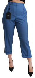 Pantalons cropped en laine plissée bleu Dolce & Gabbana avec revers et poignets, mode élégante pour femme.