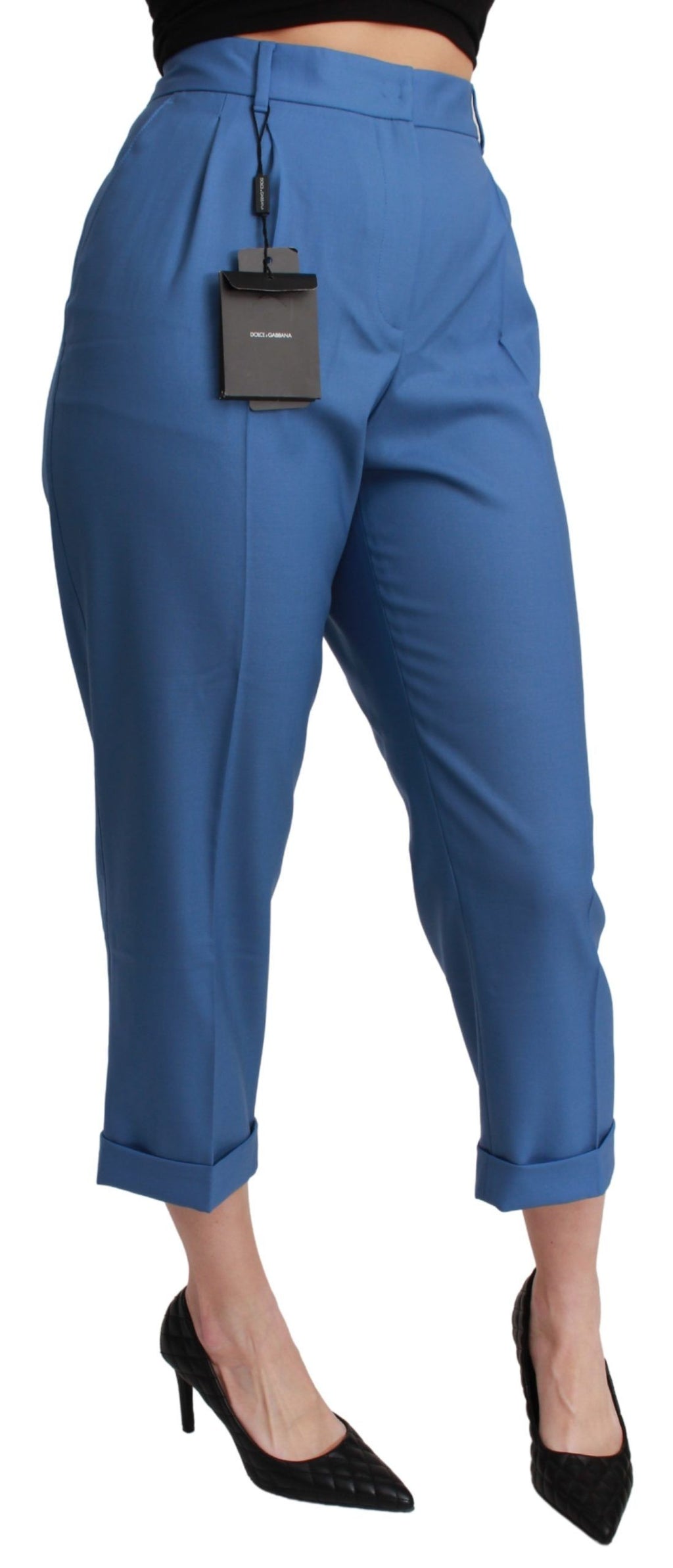 Pantalons cropped en laine bleue plissée avec revers de Dolce & Gabbana, style élégant et moderne.