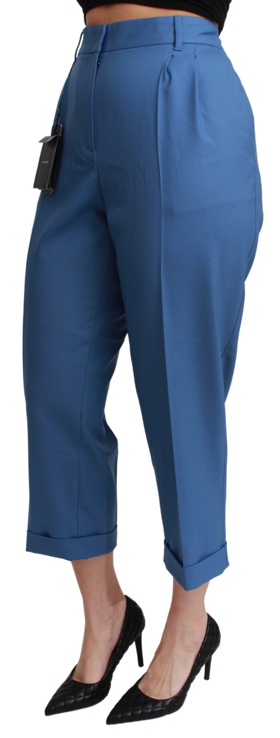 Pantalon court en laine plissée bleu Dolce & Gabbana avec poignets et coupe cropped, mode élégante et moderne.
