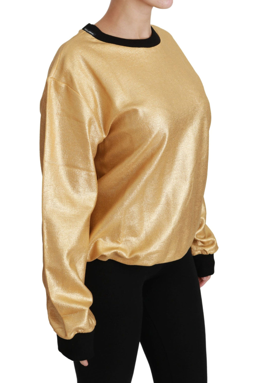 Pull-over en coton doré Dolce & Gabbana à col rond, style élégant et confortable, visible en détail dans l'image.