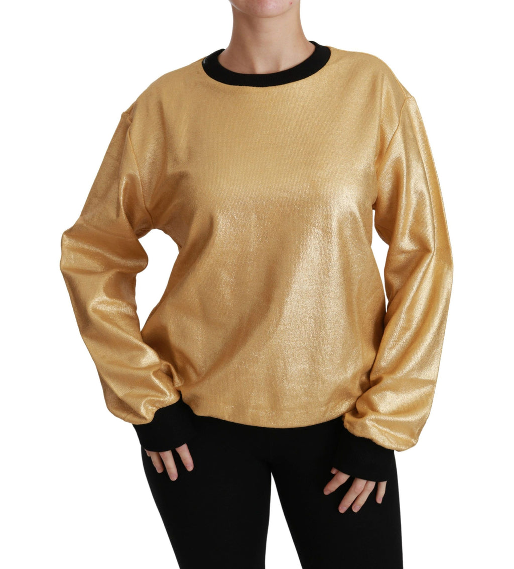 Pull-over en coton doré Dolce & Gabbana avec col rond, doux et élégant, visible sur le mannequin.