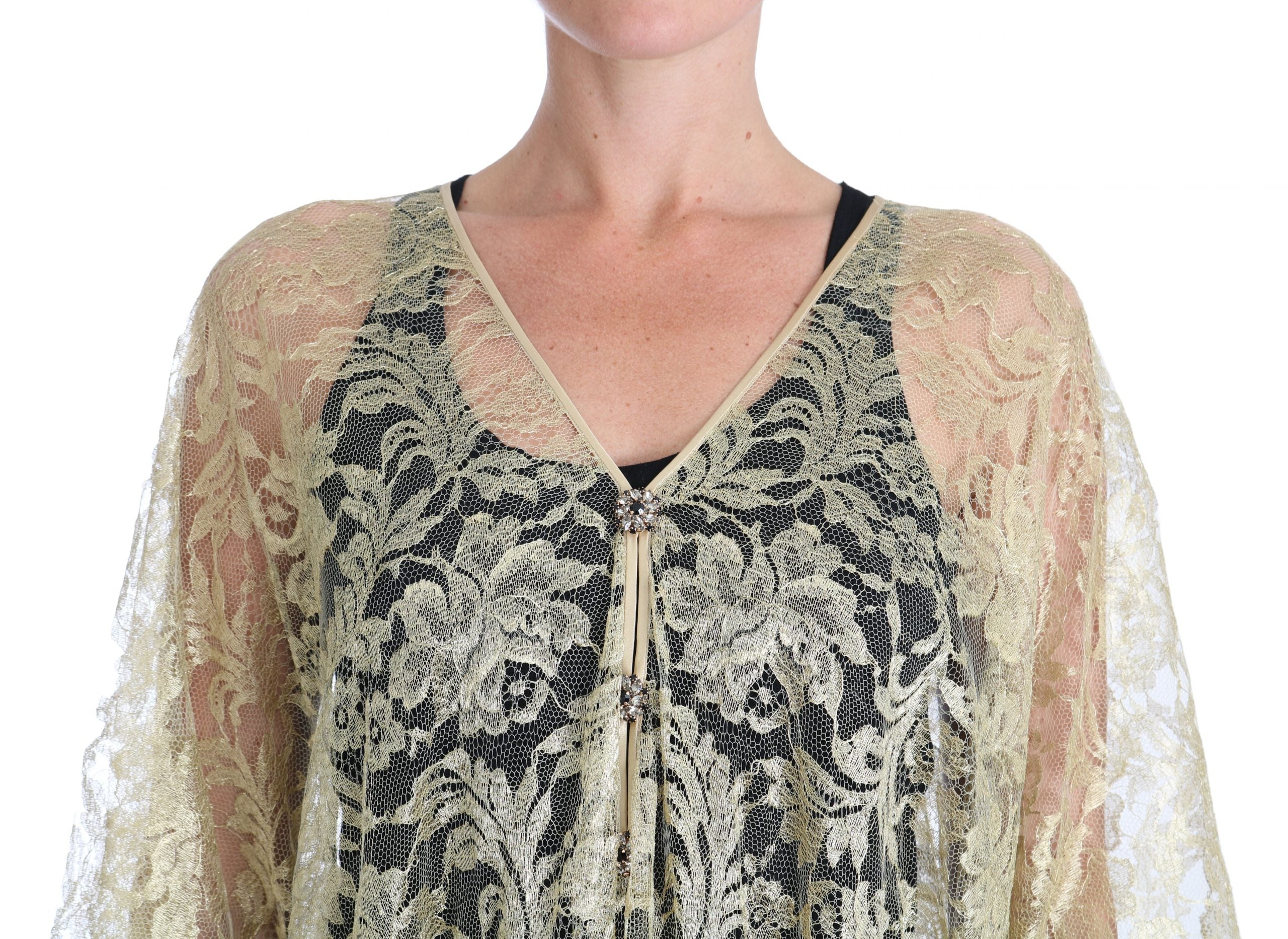 Robe longue Dolce & Gabbana en dentelle florale dorée avec cape ornée de cristaux, élégante et sophistiquée.