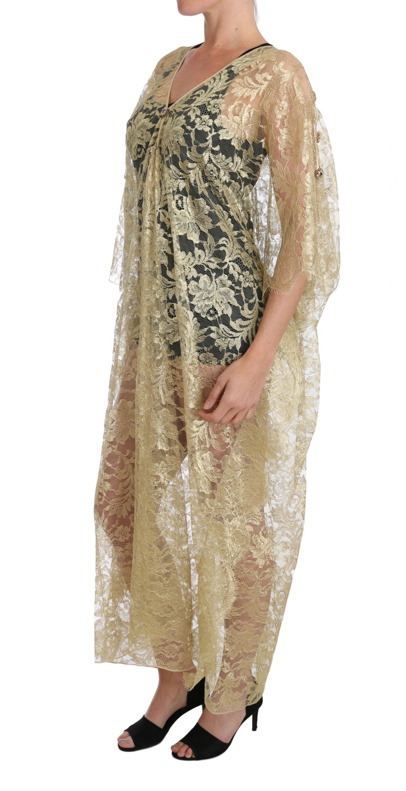 Robe longue Dolce & Gabbana en dentelle florale dorée avec cape, ornée de cristaux scintillants pour une allure élégante et sophistiquée.