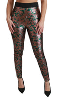 Collants verts et bronze Dolce & Gabbana, motif feuille, pantalon skinny en tissu léger, vue de face.