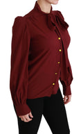 Chemise longue en soie marron Dolce & Gabbana avec manches longues, vue de face sur un fond neutre.