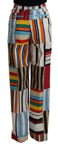Pantalon en coton à rayures multicolores à taille haute de Dolce & Gabbana, vue de face.