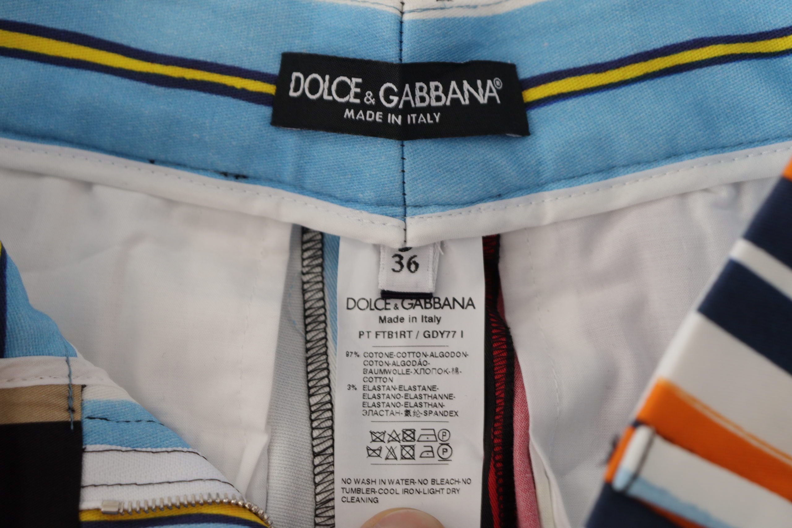 Pantalons en coton à rayures multicolores à taille haute de Dolce & Gabbana, élégants et modernes.
