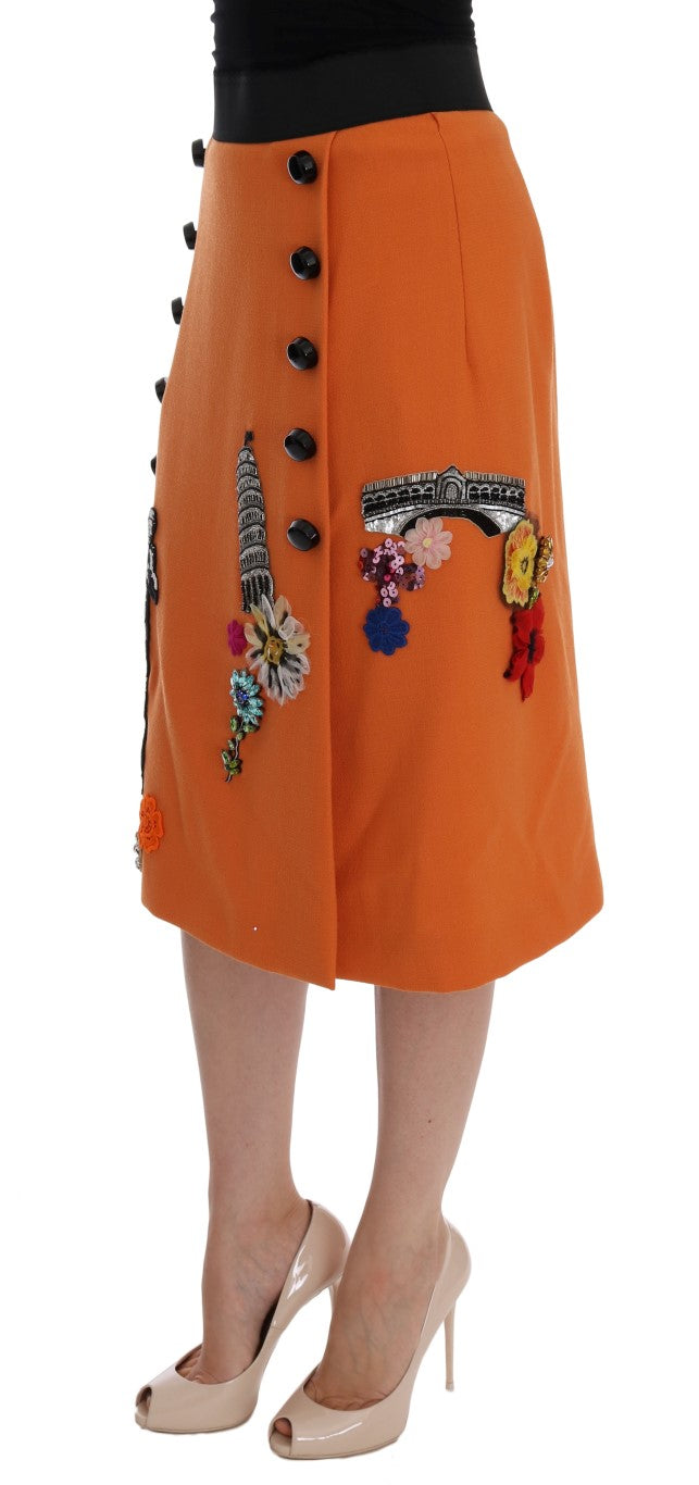 Jupe en laine orange Dolce & Gabbana avec appliqués en cristaux et sequins, élégante et ornée de détails brillants.