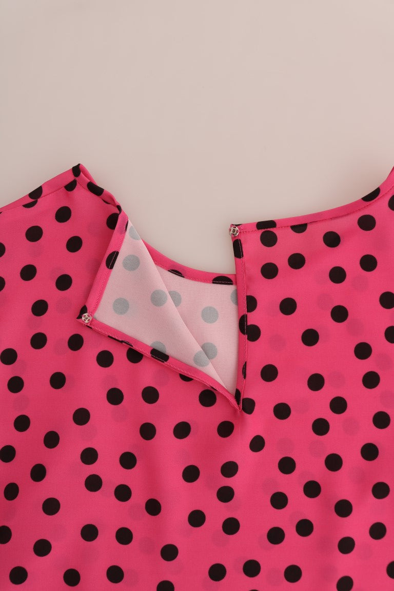 Chemise en soie rose à pois Dolce & Gabbana, élégante blouse féminine avec motifs à pois.