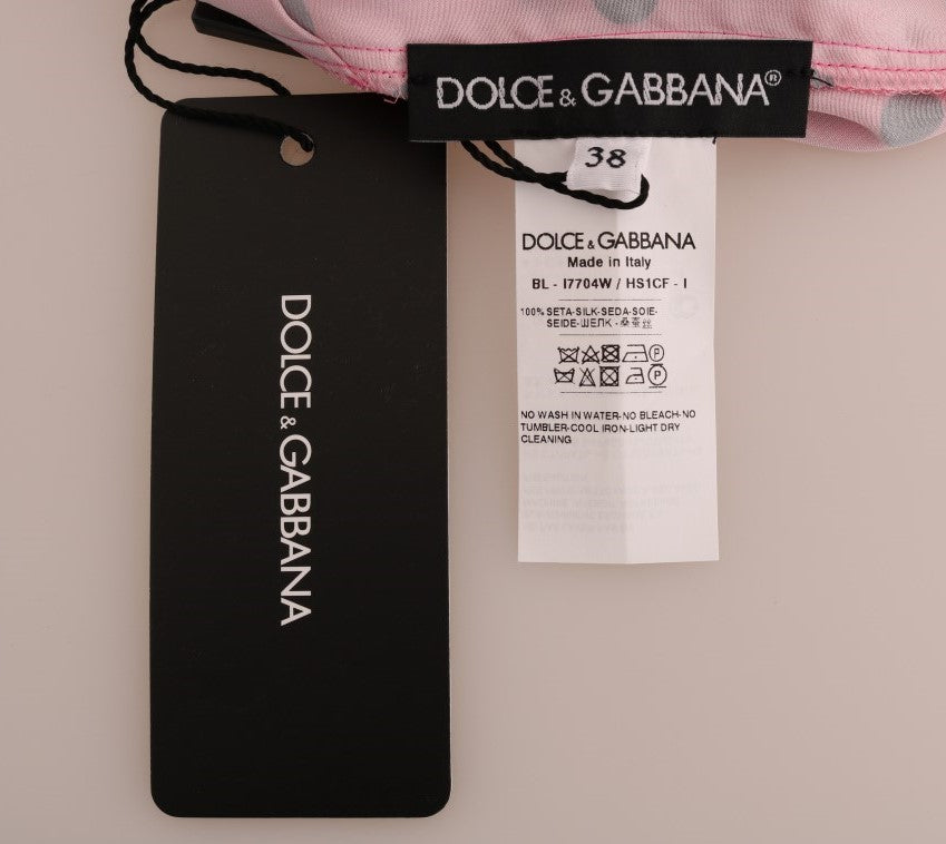 Blouse en soie rose à pois blancs de Dolce & Gabbana, élégante chemise à manches longues et col classique.