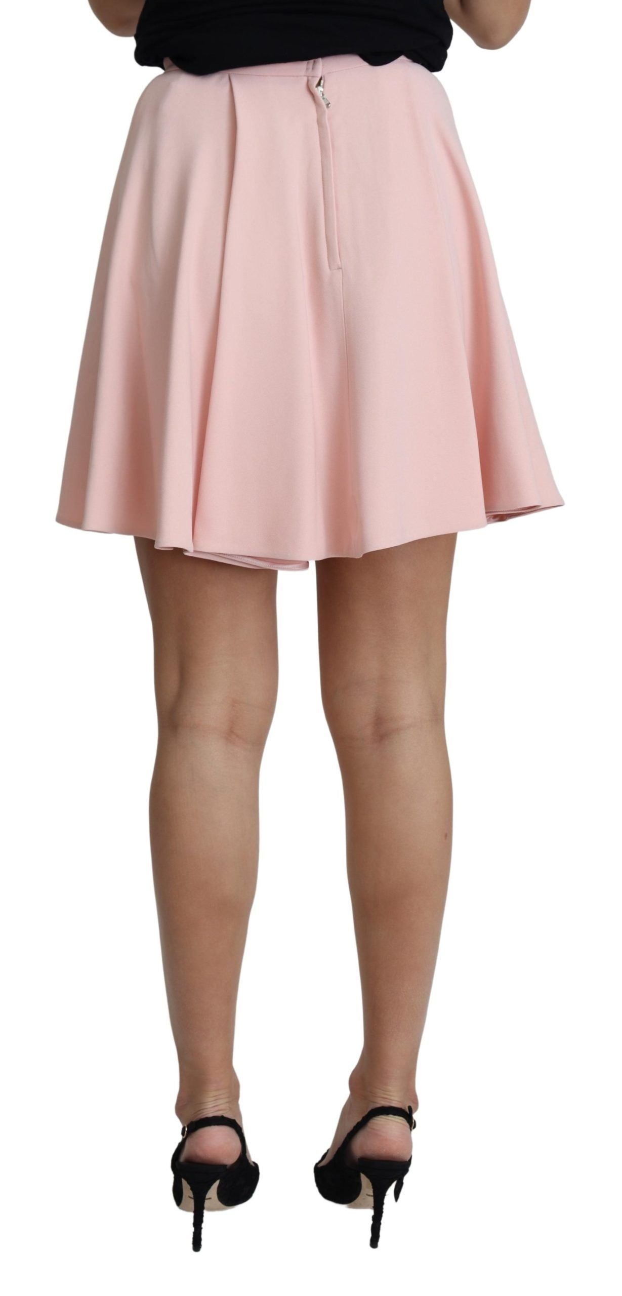 Jupe mini en rayonne rose à plis plissés et forme évasée de Dolce & Gabbana, style élégant et féminin.