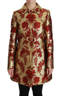 Manteau cape Dolce & Gabbana en brocart rouge et doré à motif floral, élégant et sophistiqué.